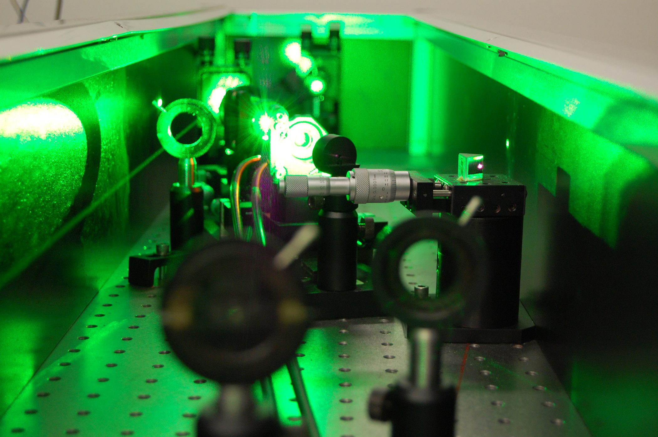 A laser in an electrical engineering lab at the University of Utah, which has won a $12 million National Science Foundation grant to launch a $21.5 million basic research program aimed at developing new materials for such uses as faster computers and communications devices and better microscopes and solar cells.
