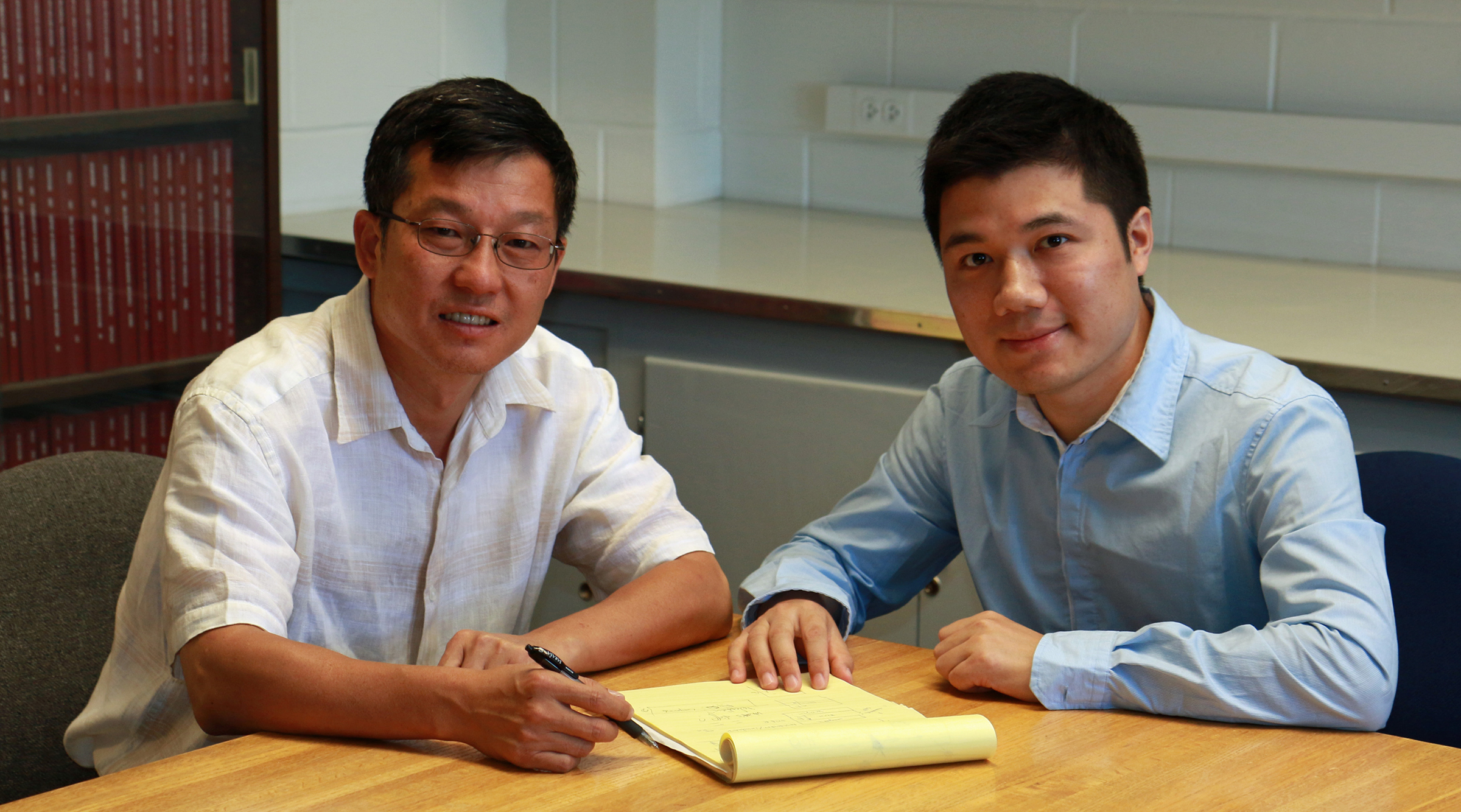 Feng Liu (left), chair of the University of Utah Department of Materials Science and Engineering, and Miao Zhou, a postdoctoral fellow, co-authored a study of a new “topological insulator” that could lead theoretically to faster computing.