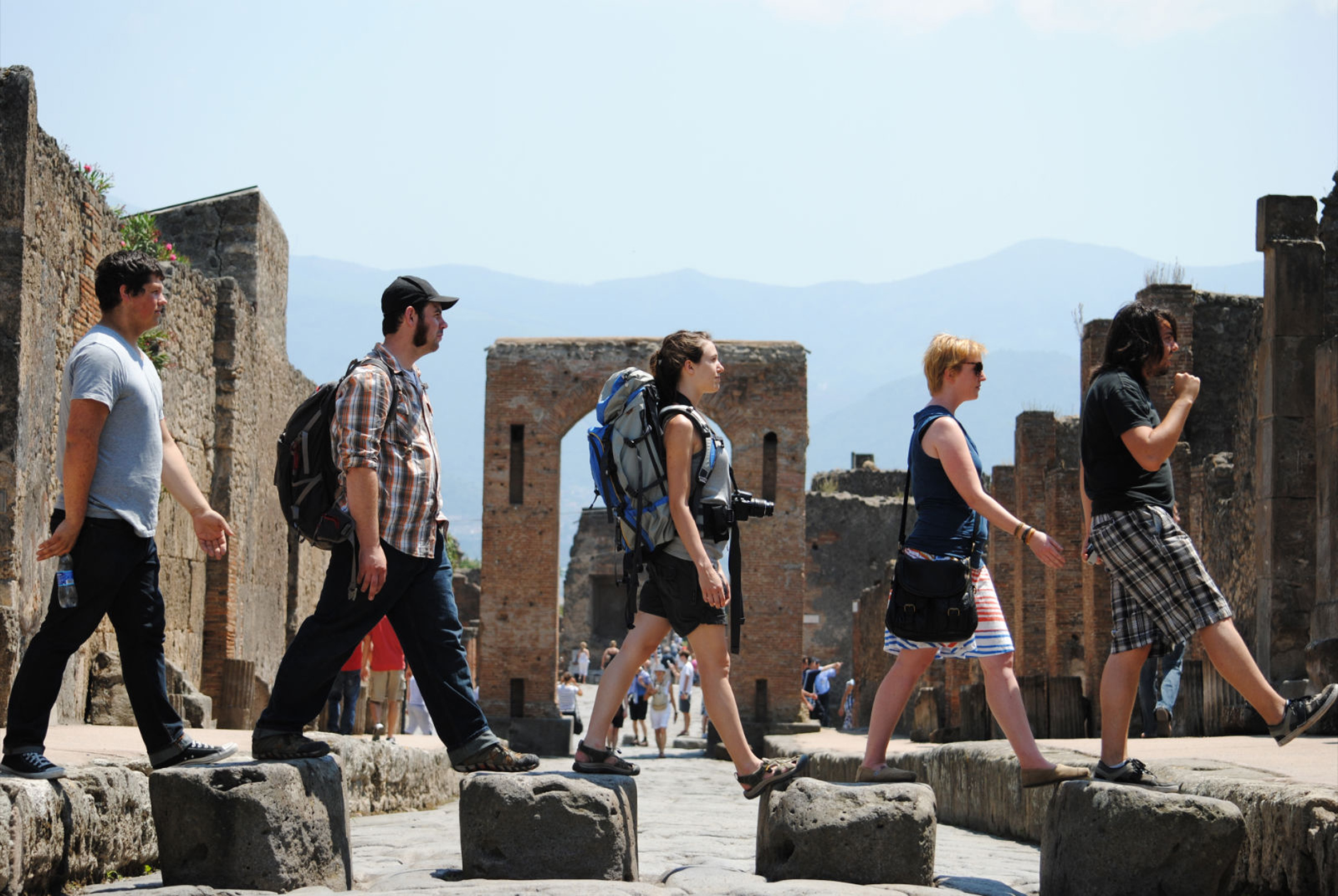 These students walk through ruins in Siena Italy while participating in the "From Minoan to Modern Times" program.