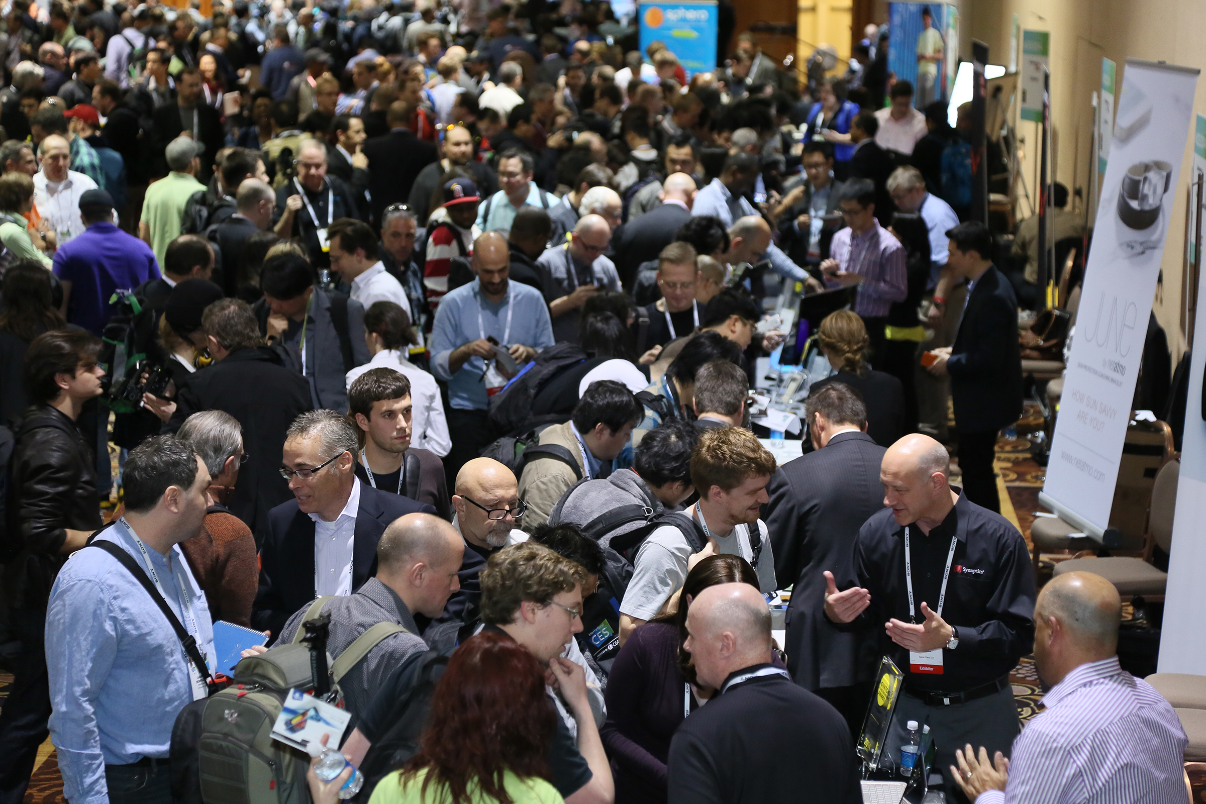 Crowds visit booths at the 2015 International Consumer Electronic Show.