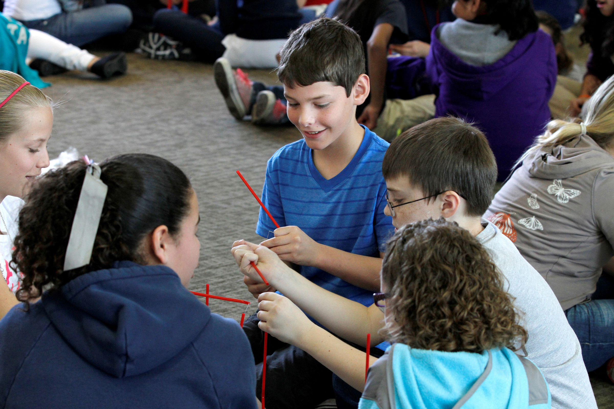 Students use plastic drinking straws to build towers that must withstand wind gusts during last year’s Elementary Engineering Week. This year’s event during March 24-28 will draw 2,000 Wasatch Front fifth- and sixth-graders. The week of activities is hosted by the University of Utah College of Engineering.
