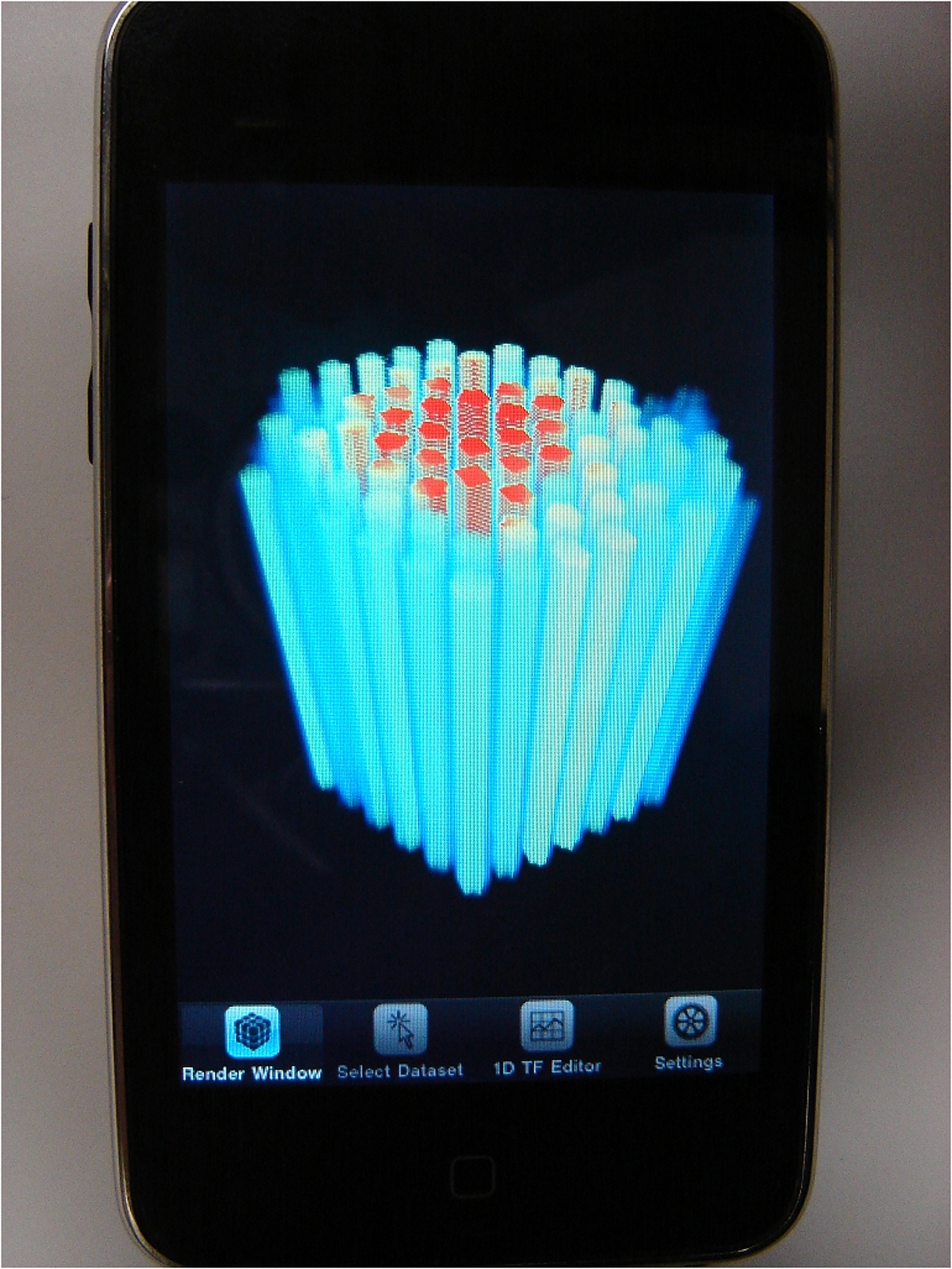 iPhone software developed at the University of Utah's Scientific Computing and Imaging Institute is being used by the university's Nuclear Engineering Program to display computer-generated simulations of a nuclear reactor's core. The simulation displayed here shows a side view of the fuel rod assembly within the university's TRIGA research reactor. Red indicates the region of the core where the nuclear fission reaction is strongest. The iPhone visualization software, ImageVis3D Mobile, is free through the Apple App Store, but the reactor simulation software is not commercially available.